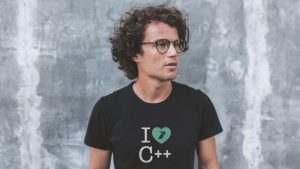 Wearing I love C++ T shirt