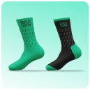A pair of green socks that have 'build faster' written on them